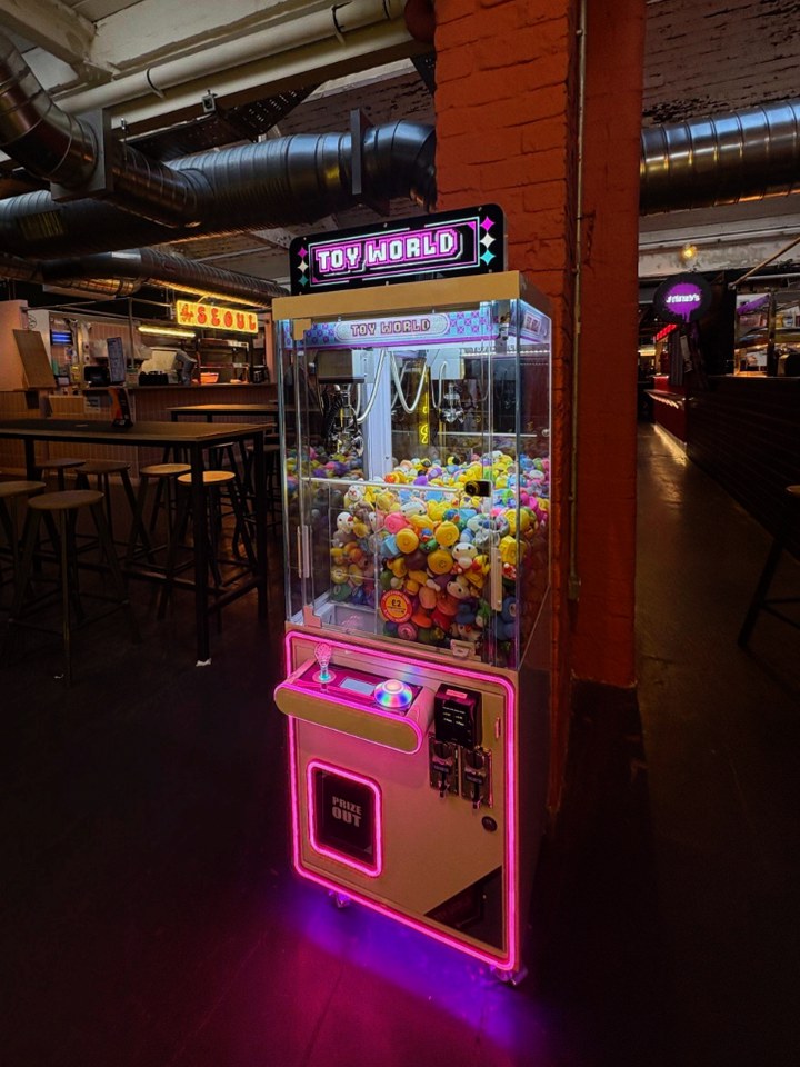 A Toy World machine in a food hall
